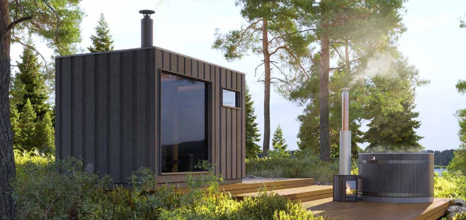 フィンランドの森の中に建つレジェンドのサウナ小屋。黒く焼いた縦板張り、大きなガラス面、屋根から立つ煙突。木のデッキが伸び、その先に湯気を上げる薪焚きのホットタブ。奥に湖