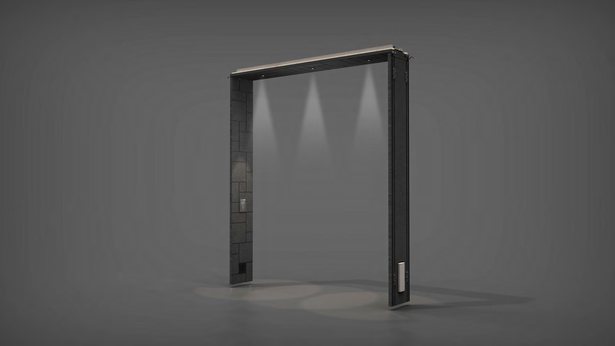門型の黒いフレーム単体のCG。上枠の内側から三つのスポットライトの光が床に落ちている。左の柱に小さな四角い部品、右の柱の下に縦長の銀色のパネル